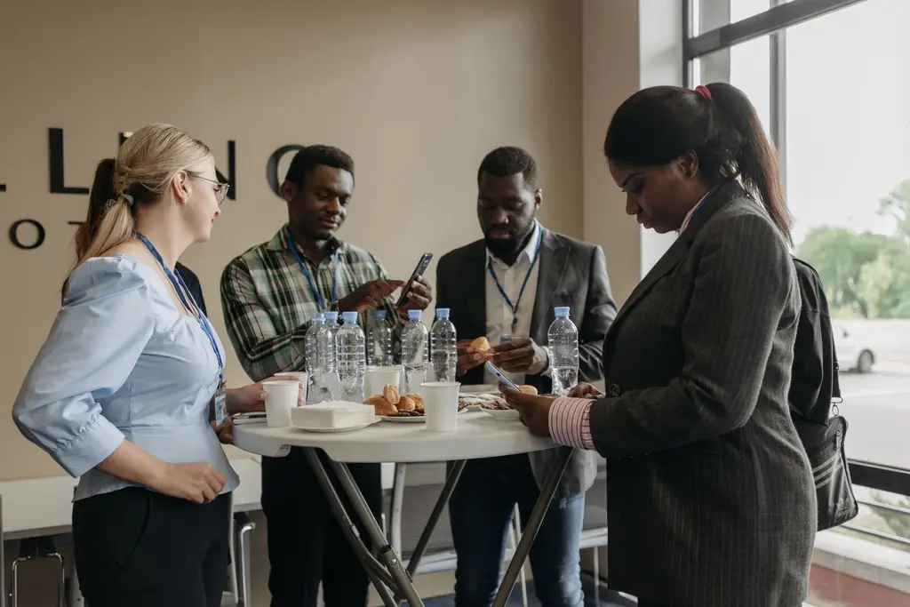 Professionals talking at a networking event